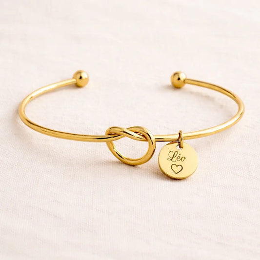 bracelet jonc personnalisé noeud avec médaille prénom gravé en acier inoxydable doré
