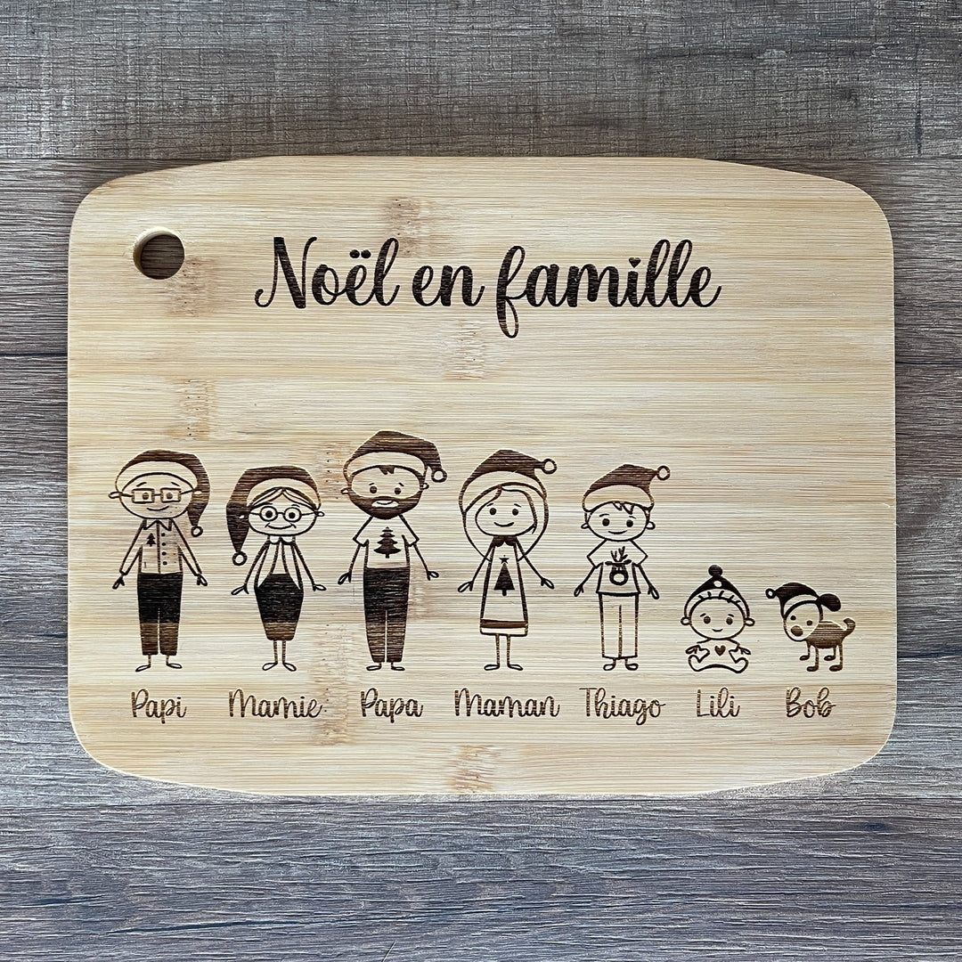 Planche à découper en bambou avec famille déguisée pour noël
