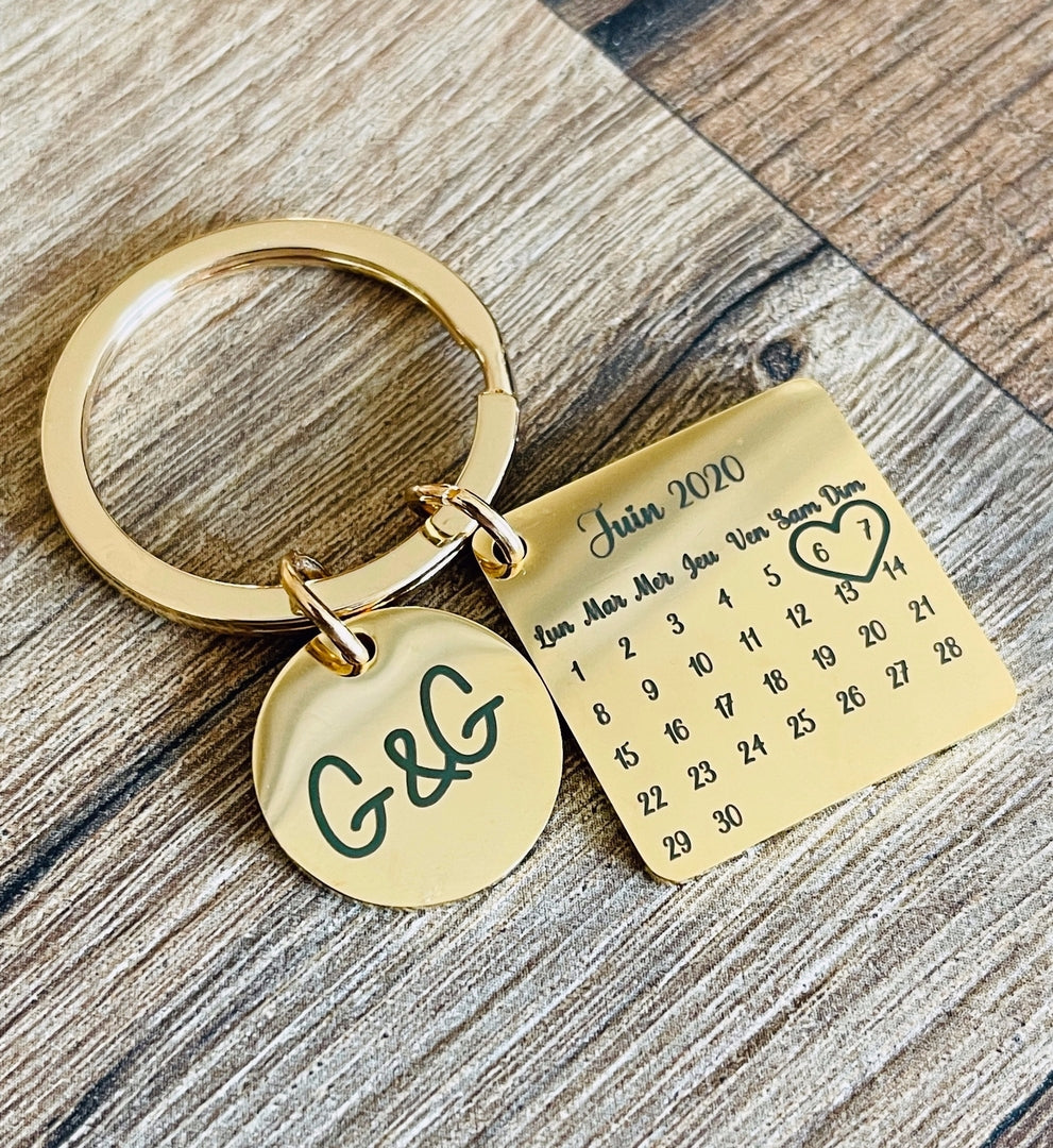 Porte clé personnalisé calendrier et médaille en inox miroir